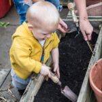 Home-Start East Lothian volunteer and toddler gardening
